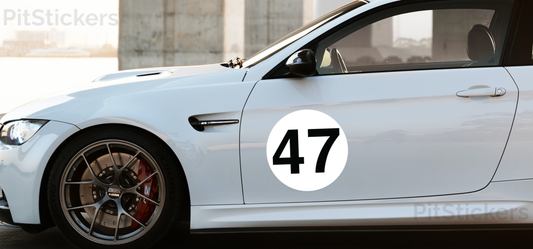 Custom roundel race car number plate displays your race car number. Available as permanent vinyl, reusable vinyl, and magnetic plates. SCCA and NASA compliant. Great for track cars, track days and autocross.